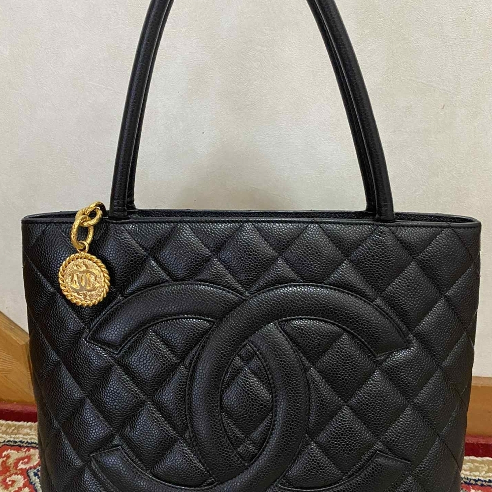CHANEL Black Quilted Tote with Gold Charm